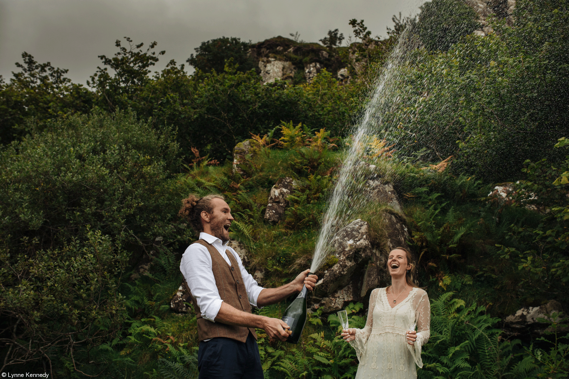 Person Spraying Champagne Into The Air